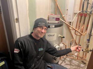 Boiler installation Leeds - Gas Safe engineer installing Vaillant boiler.